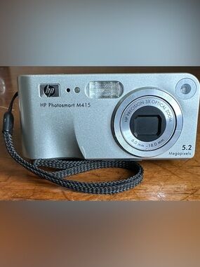 HP Photosmart M415 Compact 5.2MP 3x Optical Zoom Point & Shoot Digital Camera